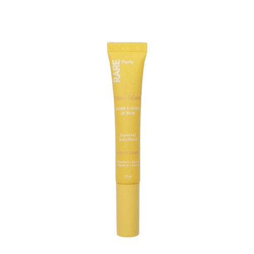 RARE Paris Trésor Solaire Soothing Lip Balm Lūpų balzamas su vitaminu E ir arnikos ekstraktu.